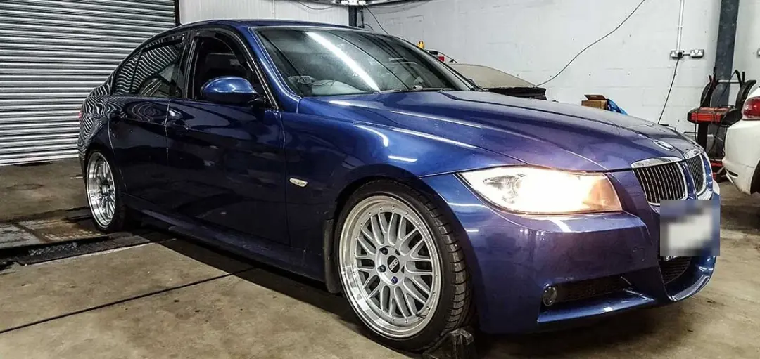 Blue BMW 3 Series on the rolling road